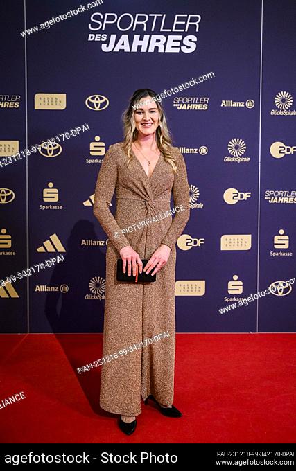 17 December 2023, Baden-Württemberg, Baden-Baden: Denise Herrmann-Wick stands on the red carpet in the Kurhaus before the ""Sportsperson of the Year 2023""...