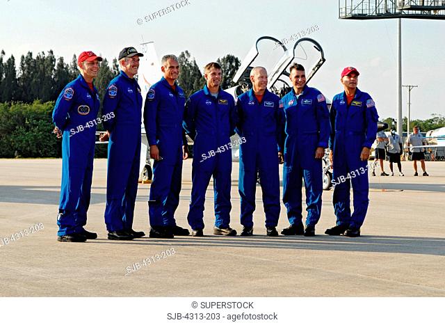 The crew of STS-117 arrives at Kennedy Space Center for launch. From right to left are Commander Rick Sturckow, Pilot Lee Archambault