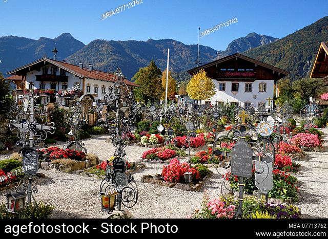 Germany, Bavaria, Upper Bavaria, Chiemgau, Schleching, cemetery at parish church 'St. Remigius', wrought-iron grave crosses