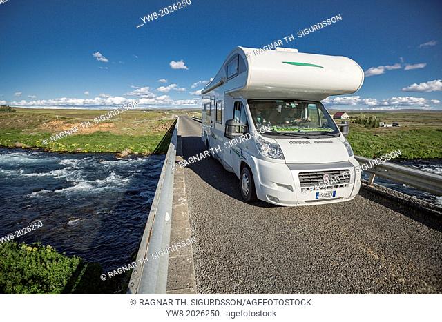 Recreational vehicle crossing over small river, South Coast, Iceland