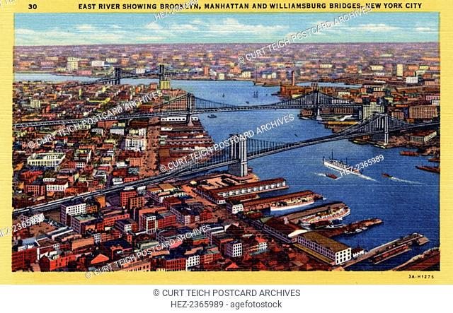 The East River, New York City, New York, USA, 1933. Vintage linen postcard showing a bird's eye view of the East River. In the foreground is the Brooklyn Bridge...