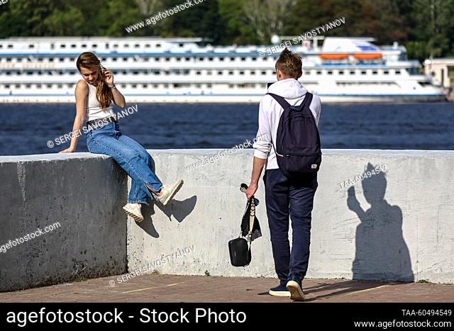 RUSSIA, MOSCOW - JULY 16, 2023: A boy and a girl are seen in Severnoye Tushino Park. Sergei Savostyanov/TASS