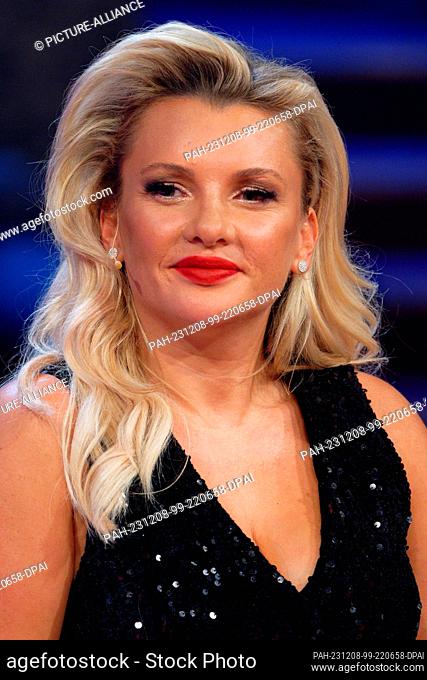 08 December 2023, North Rhine-Westphalia, Hürth: Reality TV contestant Evelyn Burdecki sits in the RTL annual review ""2023! People, Images