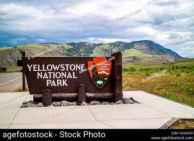 Yellowstone NP, WY, USA - June 23, 2019: A welcoming signboard at the entry point of the preserve park