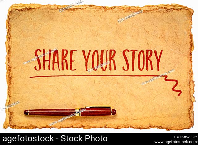 share your story - inspirational handwriting on a tan toned heavyweight deckle edge paper with a stylish pen isolated on white