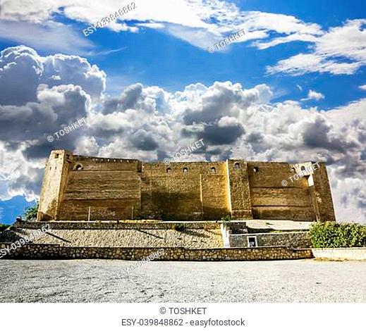 Look at the wall of the castle Kasbah in Sousse Tunisia amid dramatic cloud heaven