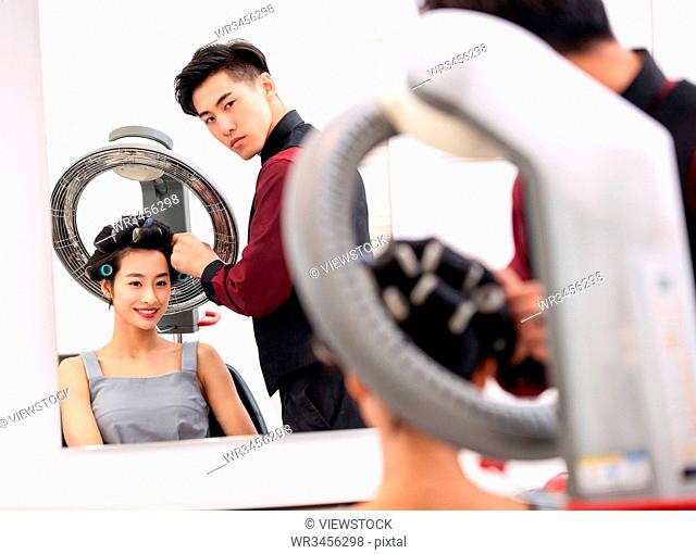 Young women in the barber's hair