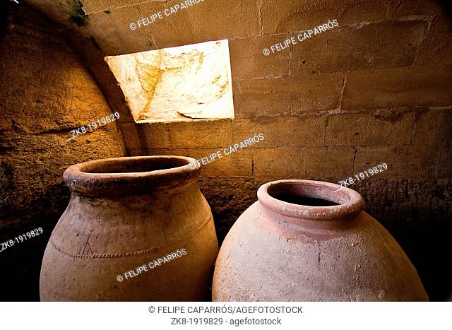 Jars of clay to preserve foods in the cellar  La Mota castle, Alcala la real, Jaen, Spain