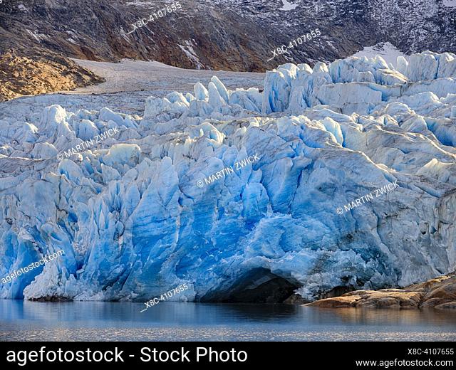 Hahn Glacier and its glacier mouth. Landscape in the Johan Petersen Fjord, a branch of the Sermilik (Sermiligaaq) Icefjord in the Ammassalik region of East...