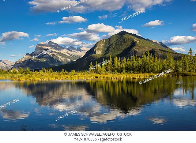 Mount Rundle and Sulphur Mountain reflected in the Vermilion Lakes in the town of Banff in Banff National Park in the Canadian Rockies in Alberta Canada
