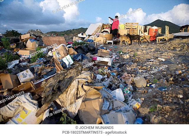 Sint Maarten, the great salt pond landfill is used as a garbage dump People live here