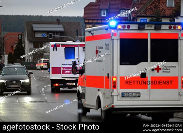 24 February 2020, Hessen, Volkmarsen: Ambulances are driving through the village. In Volkmarsen in northern Hesse, a car has driven into a Rose Monday...