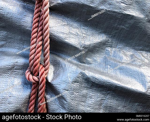 Rope knots over a tarp