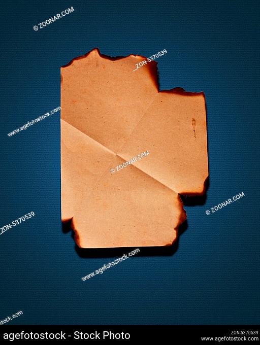 Burning Paper with burned edges for a background