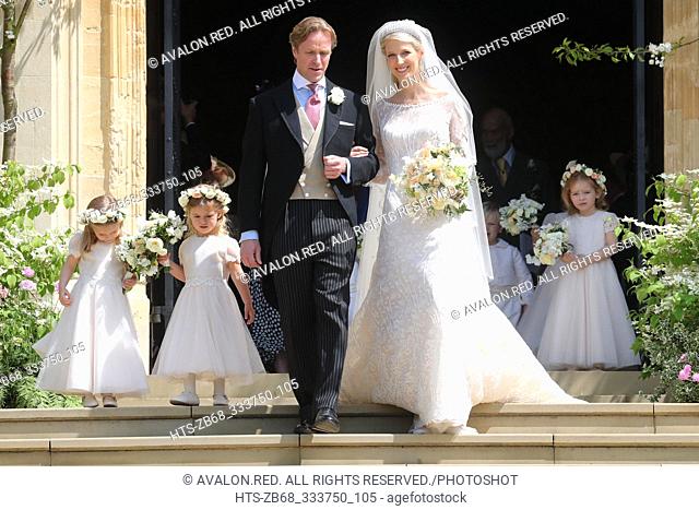 Newlyweds Mr Thomas Kingston and Lady Gabriella Windsor walk down the steps of the chapel with their bridesmaids after their wedding at St George's Chapel on...