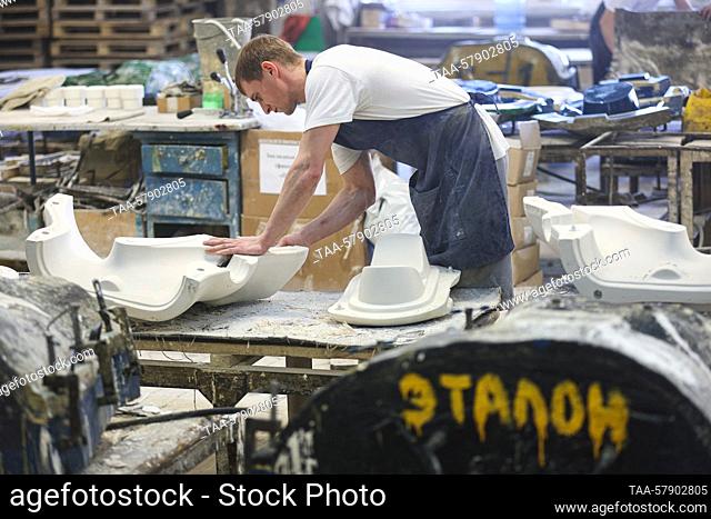 RUSSIA, SAMARA REGION - MARCH 15, 2023: A man makes gypsum moulds at the Samara Stroyfarfor factory in the rural town of Stroykeramika, 20km northeast of Samara