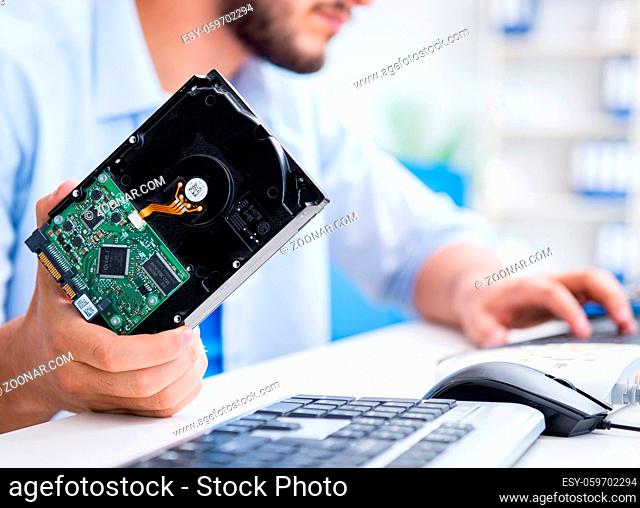 The technician with broken hard drive