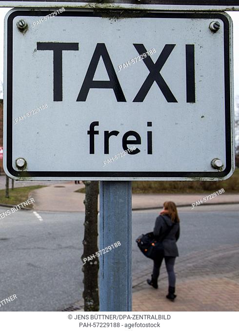 Road signs can be seen at a taxi stand in front of the railway station of Hagenow, Germany, 13 March 2015. The introduction of minimum wages has caused taxi...