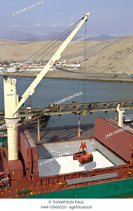 Cargo ship being unloaded at the port of Salaverry, Trujillo, Peru