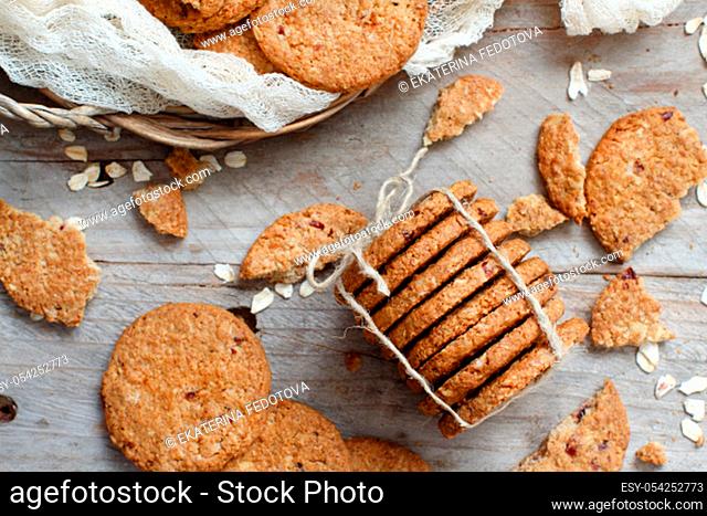 Homemade oatmeal cookies top view on a wooden table