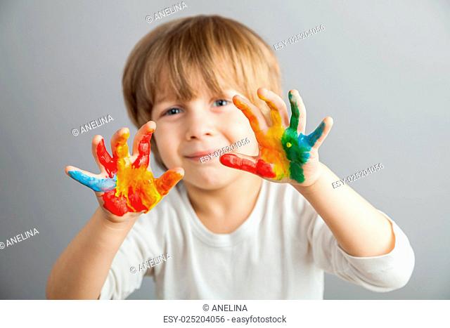 hands painted in colorful paints