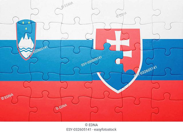 puzzle with the national flag of slovakia and slovenia . concept