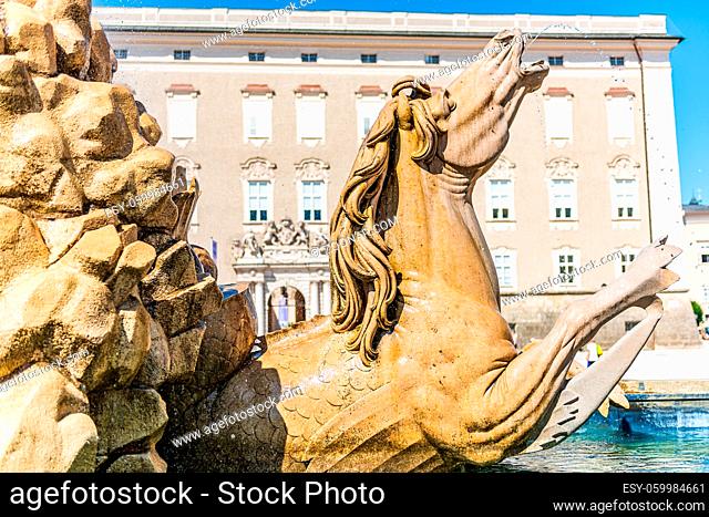 The horse of the Residenz fountain in the square between Cathedral and Residenz in the old town of Salzburg, Austria