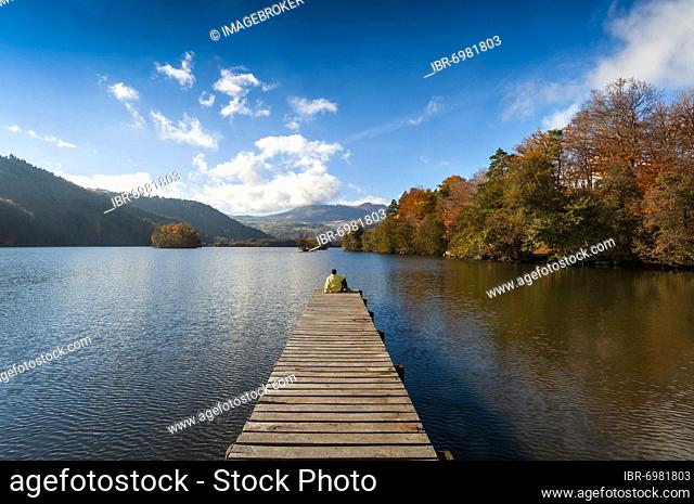 Lake Chambon in autumn, Puy de Dome department, Auvergne-Rhone-Alpes, France, Europe