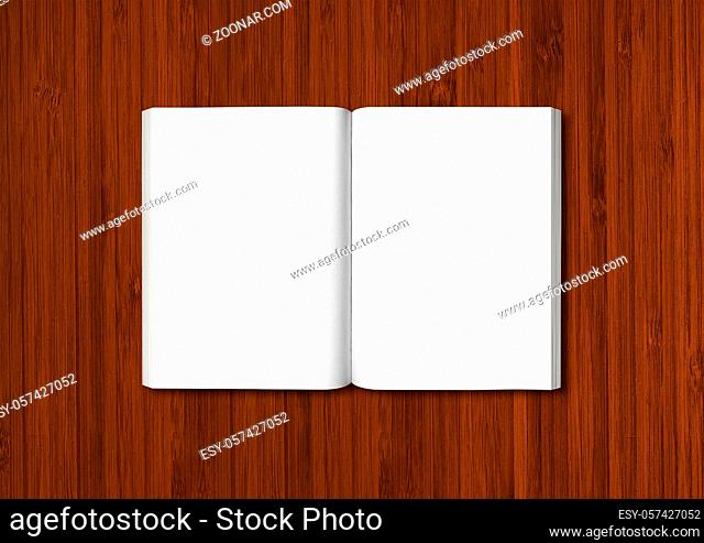Open book isolated on a dark wooden background