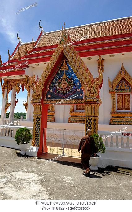 nun at wat tham yai prik, temple and meditation retreat spiritual development centre, koh si chang , sri racha, chonburi, thailand