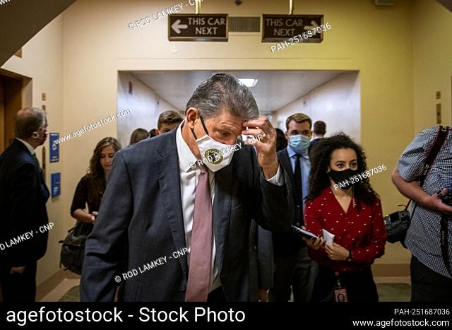 United States Senator Joe Manchin III (Democrat of West Virginia) talks with reporters as he walks through the Senate subway during a vote at the US Capitol in...
