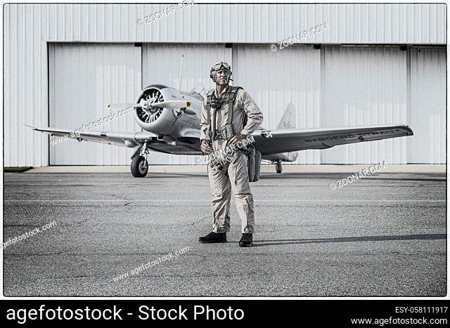 A WWII military pilot with his SNJ5 aircraft returning from a mission