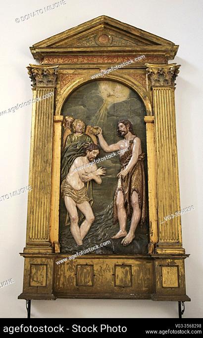 Toledo, Castilla-La Mancha, Spain, Europe. Monastery of San Juan de los Reyes (1477â. “1504). Interior of the church. Bas-relief depicting the baptism of Jesus...