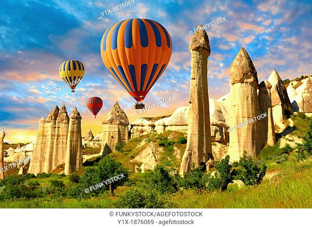 Hot Air Baloons over the Love Valley at sunrise , Cappadocia Turkey