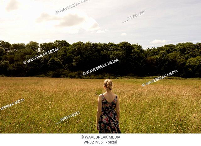 Woman standing in the field