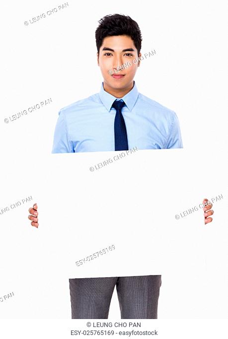 Young businessman show with white board