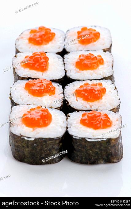Sushi set and composition at white background. Japanese food restaurant, sushi maki gunkan roll plate or platter set