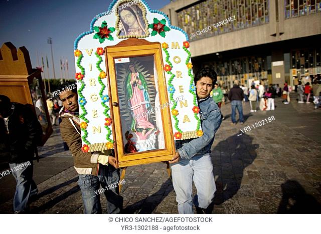Pilgrims carry an image of the Our Lady of Guadalupe in Mexico City, December 6, 2008  Hundreds of thousands of Mexican pilgrims converged on the Our Lady of...