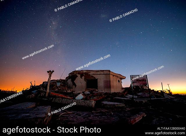 View of abandoned shop against milky way in sky, Villa Epecuen