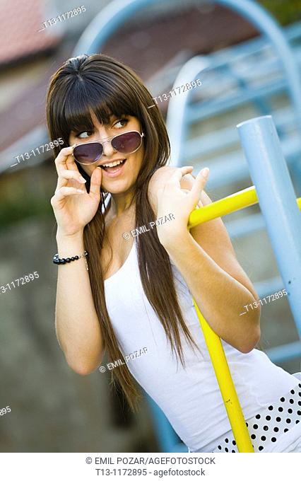Surprised young woman on the playground