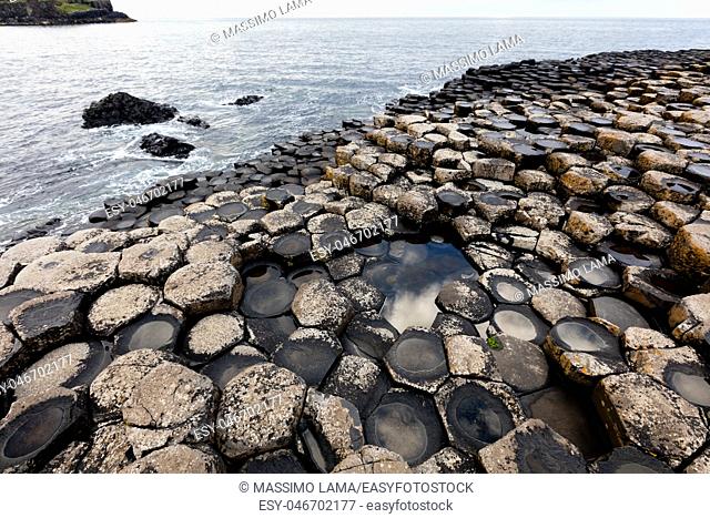The Giant's Causeway is an area of about 40, 000 interlocking basalt columns, the result of an ancient volcanic eruption