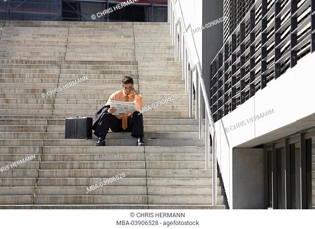 City, man, young, suit, file-suitcases, newspaper, sitting reads, position-ads, thoughtfully, business, free-stairway, stairway-ascent, steps, people, managers