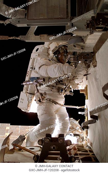 Astronaut Sunita L. Williams, Expedition 14 flight engineer, participates in the first of three sessions of extravehicular activity (EVA) in nine days