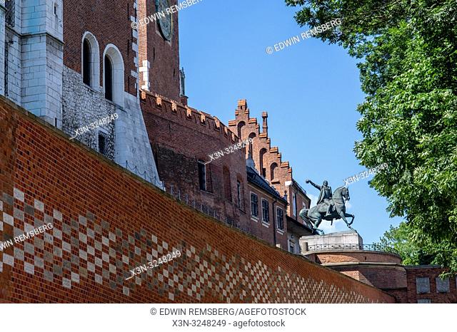 Exterior of Wawel Royal Castle from outside of walls with Tadeusz KoŠ›ciuszko Monument, Kraków, Lesser Poland Voivodeship, Poland