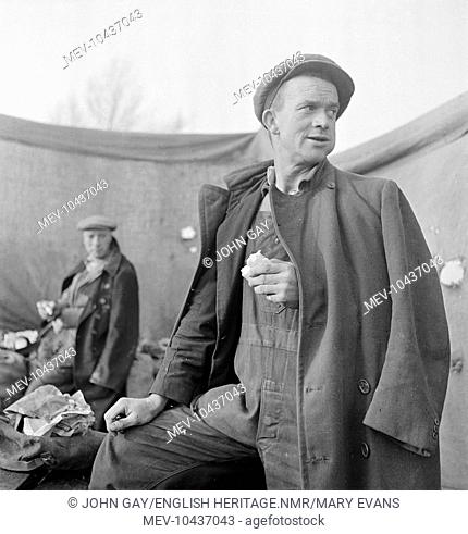 Portrait of Charles Wright, a potato farm worker, having a lunch break on the Lincolnshire Fens near Holbeach, Lincolnshire