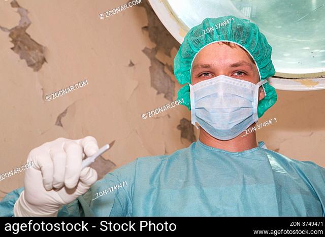 Surgeon have sadistic look before coming difficult surgery