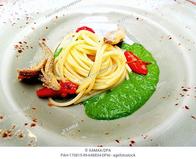 Picture of spaghetti with parsley sauce and fried anchovies, taken in Berlin, Germany, 31 July 2017. Photo: XAMAX/dpa. - Berlin/Berlin/Germany