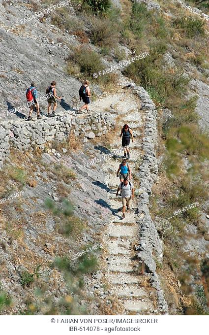 Hiking group on the 5000 Steps Moorish hiking trail between Fleix and Benimaurell, Costa Blanca, Spain, Europe