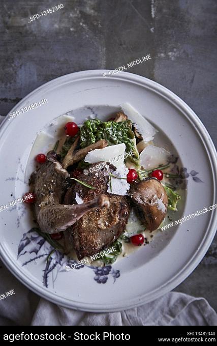 wood grouse in white wine with savoy cabbage