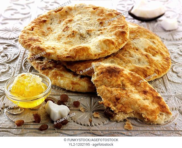Peshwari Naan  coconut sultanas and honey Bread - Indian Cuisine